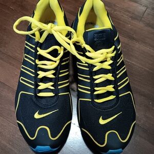 Nike Black and Yellow Athletic Shoes Dynamic Design